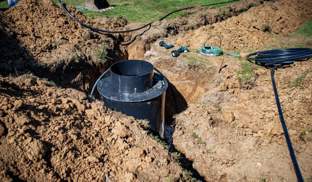 Sarasota County demolition contractor installing underground utility line and storm drainage system in Venice FL